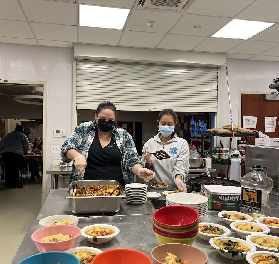 Volunteers serving food