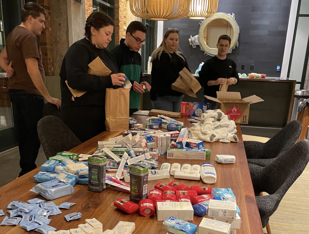 Volunteers packing care kits