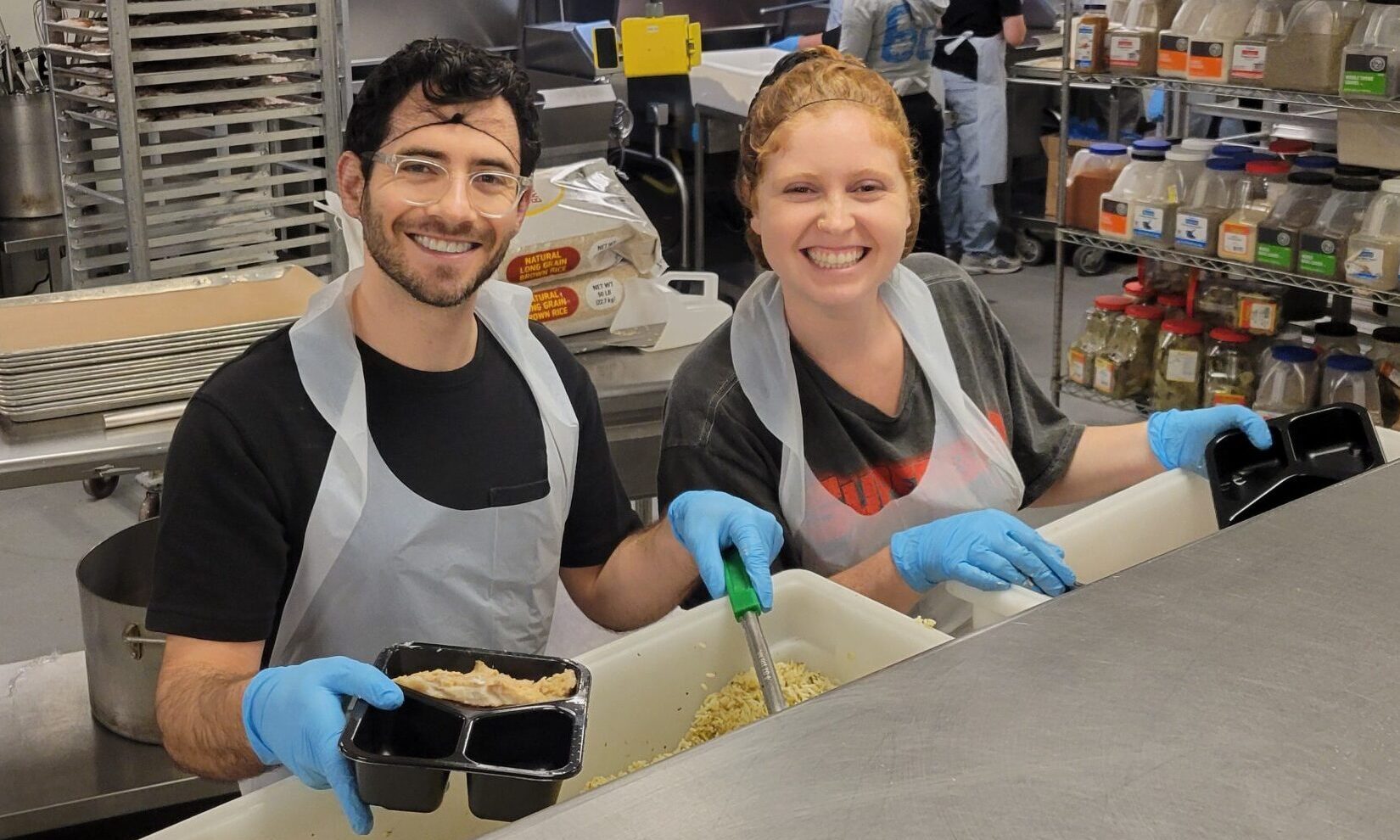 Repair the World Los Angeles volunteers preparing meals.